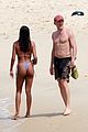vincent cassel paddleboarding with wife tina kunakey 01