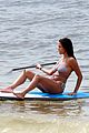vincent cassel paddleboarding with wife tina kunakey 12
