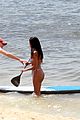 vincent cassel paddleboarding with wife tina kunakey 14