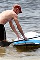 vincent cassel paddleboarding with wife tina kunakey 16