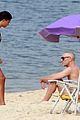 vincent cassel paddleboarding with wife tina kunakey 25