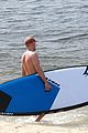 vincent cassel paddleboarding with wife tina kunakey 29