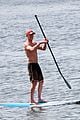 vincent cassel paddleboarding with wife tina kunakey 34