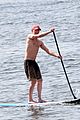 vincent cassel paddleboarding with wife tina kunakey 36