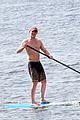 vincent cassel paddleboarding with wife tina kunakey 37