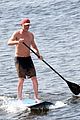 vincent cassel paddleboarding with wife tina kunakey 40