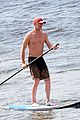 vincent cassel paddleboarding with wife tina kunakey 43