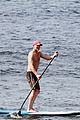 vincent cassel paddleboarding with wife tina kunakey 45