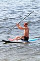 vincent cassel paddleboarding with wife tina kunakey 47