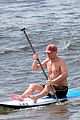 vincent cassel paddleboarding with wife tina kunakey 48