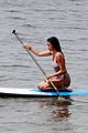 vincent cassel paddleboarding with wife tina kunakey 50