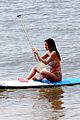 vincent cassel paddleboarding with wife tina kunakey 51