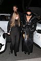 kim kardashian wears large sunglasses black leather trench coat art gallery 17