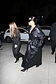 kim kardashian wears large sunglasses black leather trench coat art gallery 23