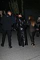 kim kardashian wears large sunglasses black leather trench coat art gallery 26