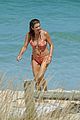 kate walsh packs on the pda with boyfriend andrew nixon at the beach 07