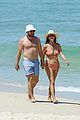 kate walsh packs on the pda with boyfriend andrew nixon at the beach 09