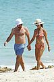 kate walsh packs on the pda with boyfriend andrew nixon at the beach 21