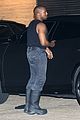 kanye west flaunts his muscles while dining with a kim kardashian lookalike 02