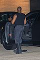 kanye west flaunts his muscles while dining with a kim kardashian lookalike 24