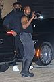 kanye west flaunts his muscles while dining with a kim kardashian lookalike 25