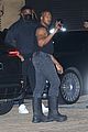 kanye west flaunts his muscles while dining with a kim kardashian lookalike 29