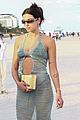dua lipa wears cut out dress during beach day in miami 15