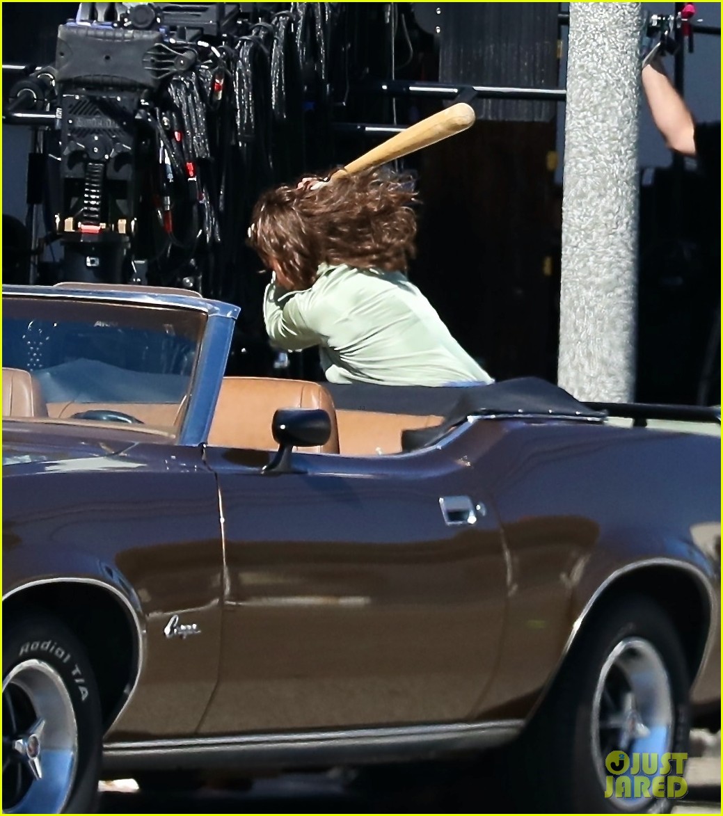 Photo: sofia vergara chases her co star around with a bat filming