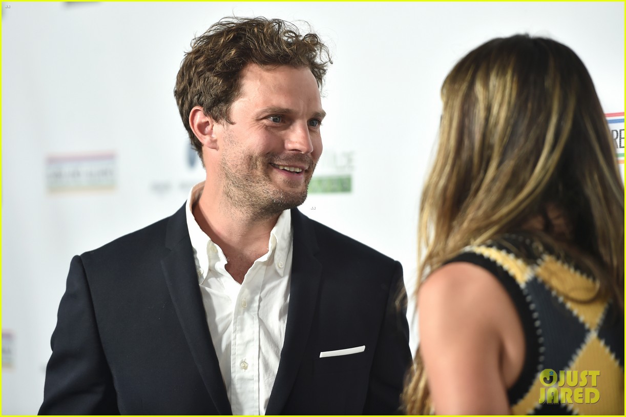 Jamie Dornan Uses Handcuffs to Make 'Fifty Shades' Joke While Accepting