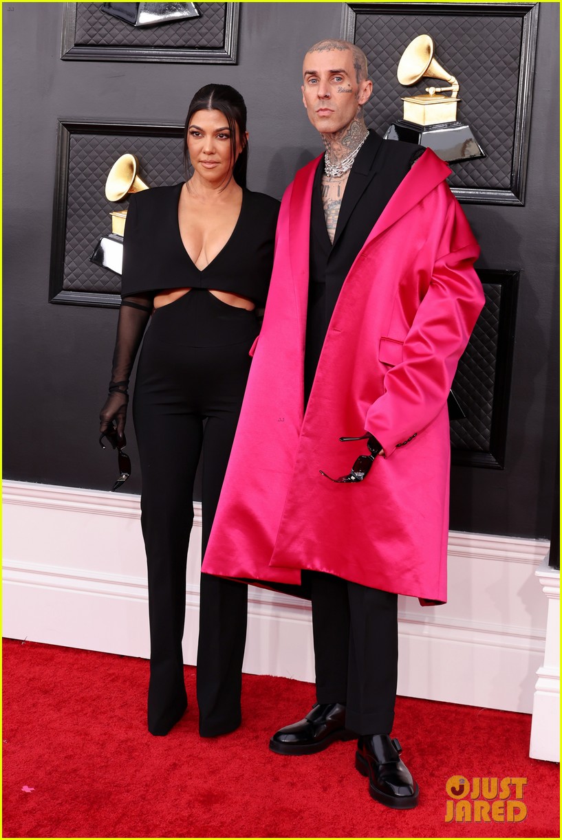 Kourtney Kardashian & Travis Barker Share Steamy Kiss on Grammys 2022