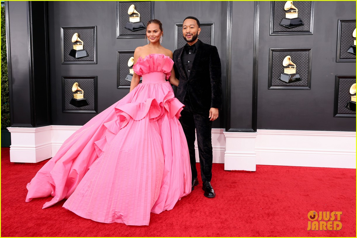 Chrissy Teigen Turns Heads In a Pink Princess Dress For Grammys 2022