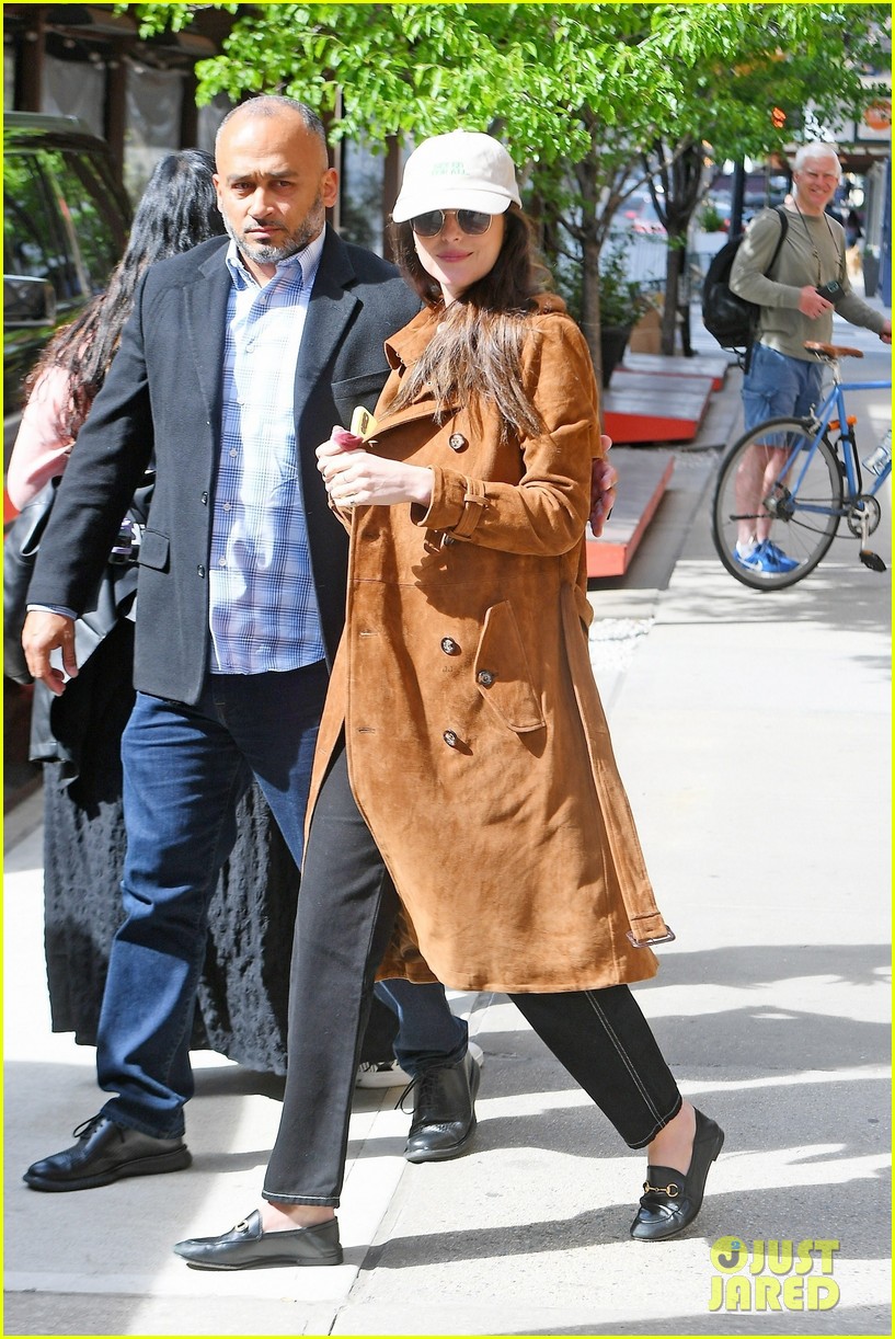 Dakota Johnson Wears Bright White Blazer For A Dinner Meeting in NYC