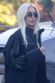kim kardashian pairs bleached blonde hair with all black outfit saturday outing 02