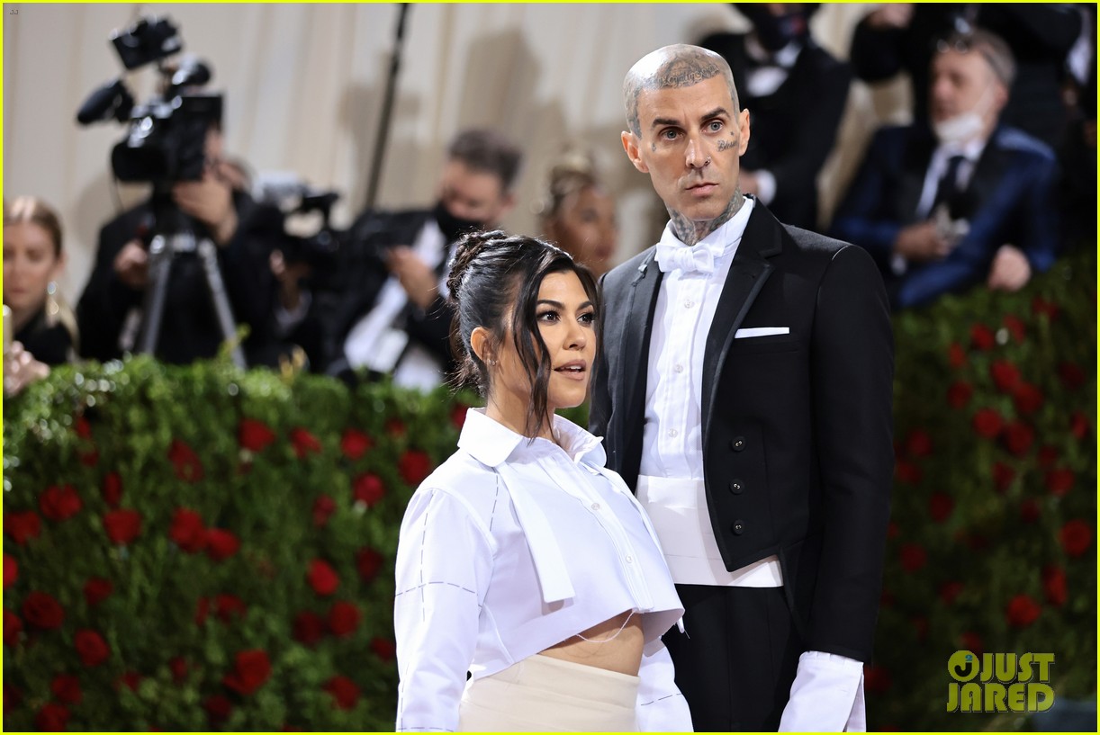 Kourtney Kardashian & Travis Barker Share a Kiss on the Met Gala 2022
