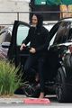 chris pine sports all black outfit for afternoon meeting 05