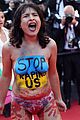 topless protestor at cannes film festival 02