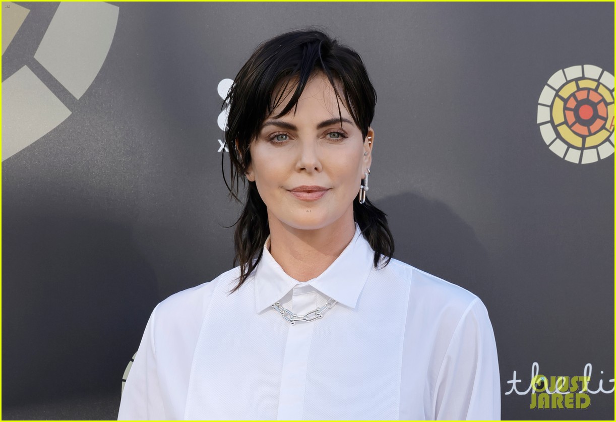 charlize theron debuts black hair at her charity event 134773918