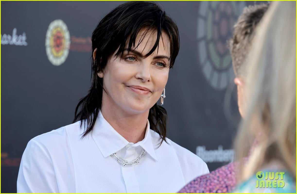 charlize theron debuts black hair at her charity event 164773921