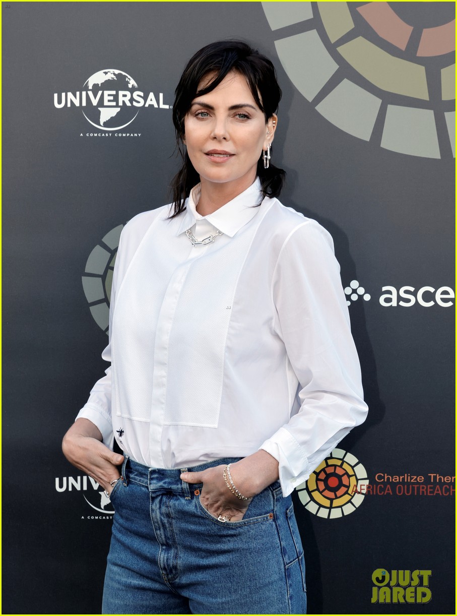 charlize theron debuts black hair at her charity event 234773928