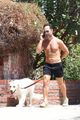 chris diamantopoulos goes shirtless for afternoon walk with his dog 01