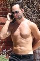 chris diamantopoulos goes shirtless for afternoon walk with his dog 02