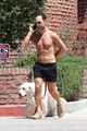 chris diamantopoulos goes shirtless for afternoon walk with his dog 03