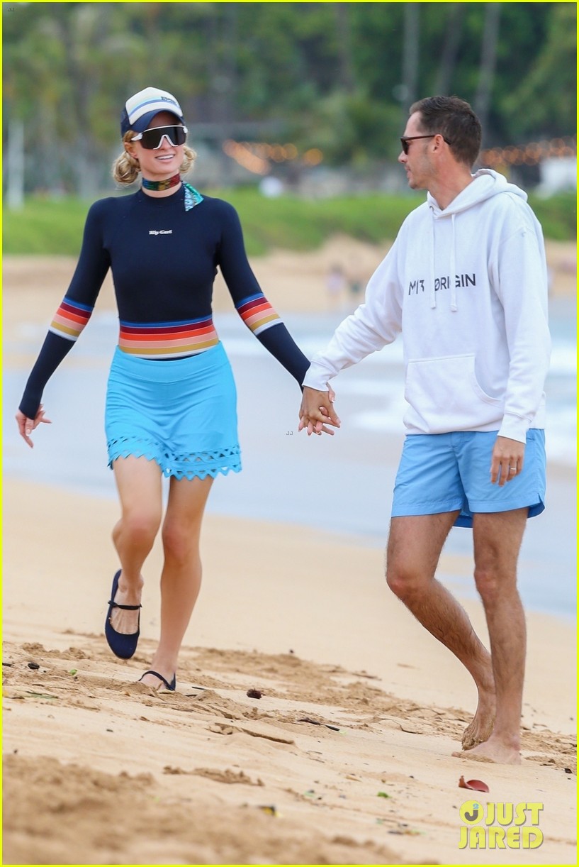 Paris Hilton & Husband Carter Reum Share Sweet Kiss on Vacation in Maui