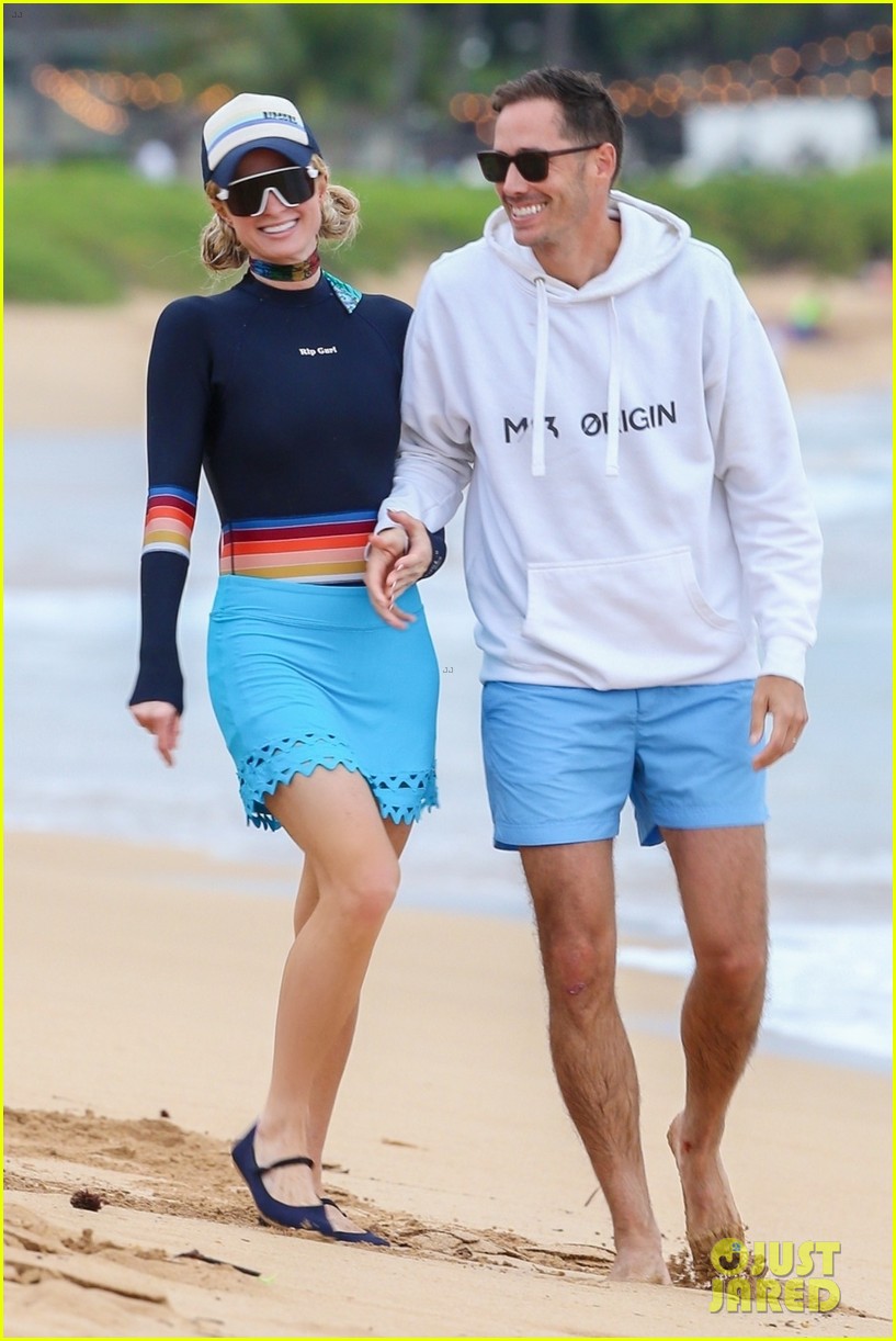 Paris Hilton & Husband Carter Reum Share Sweet Kiss on Vacation in Maui