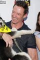 hugh jackman sutton foster cuddle with puppies at broadway barks event 01