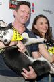 hugh jackman sutton foster cuddle with puppies at broadway barks event 03