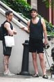 zachary quinto talks with a friend during walk around nyc 01