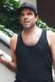 zachary quinto talks with a friend during walk around nyc 04