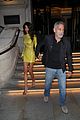 amal clooney yellow dress change george after ticket premiere 01