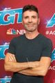 simon cowell joined by eric at agt show 04